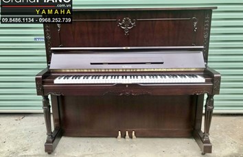 Đàn piano cơ ROYALE DRDLX (O5xxxx) màu nâu gỗ, kiểu dáng cổ điển.